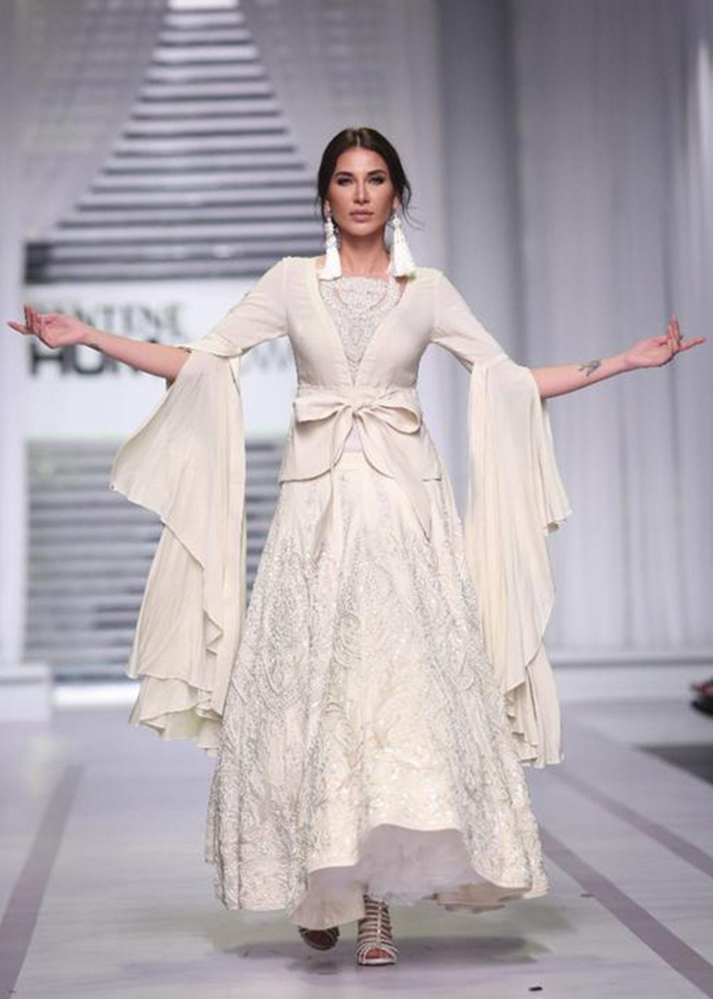 Jacket with Trailing Sleeves worn with a Paneled Lehenga