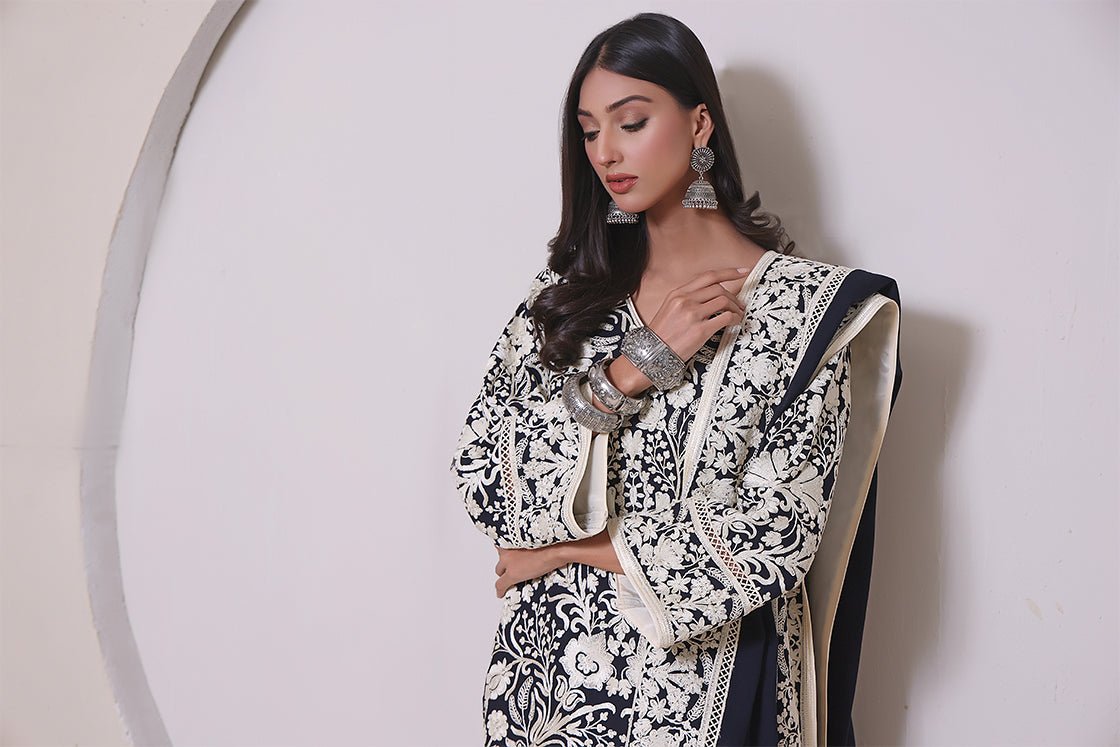 Kurta with intricate white dori embroidery