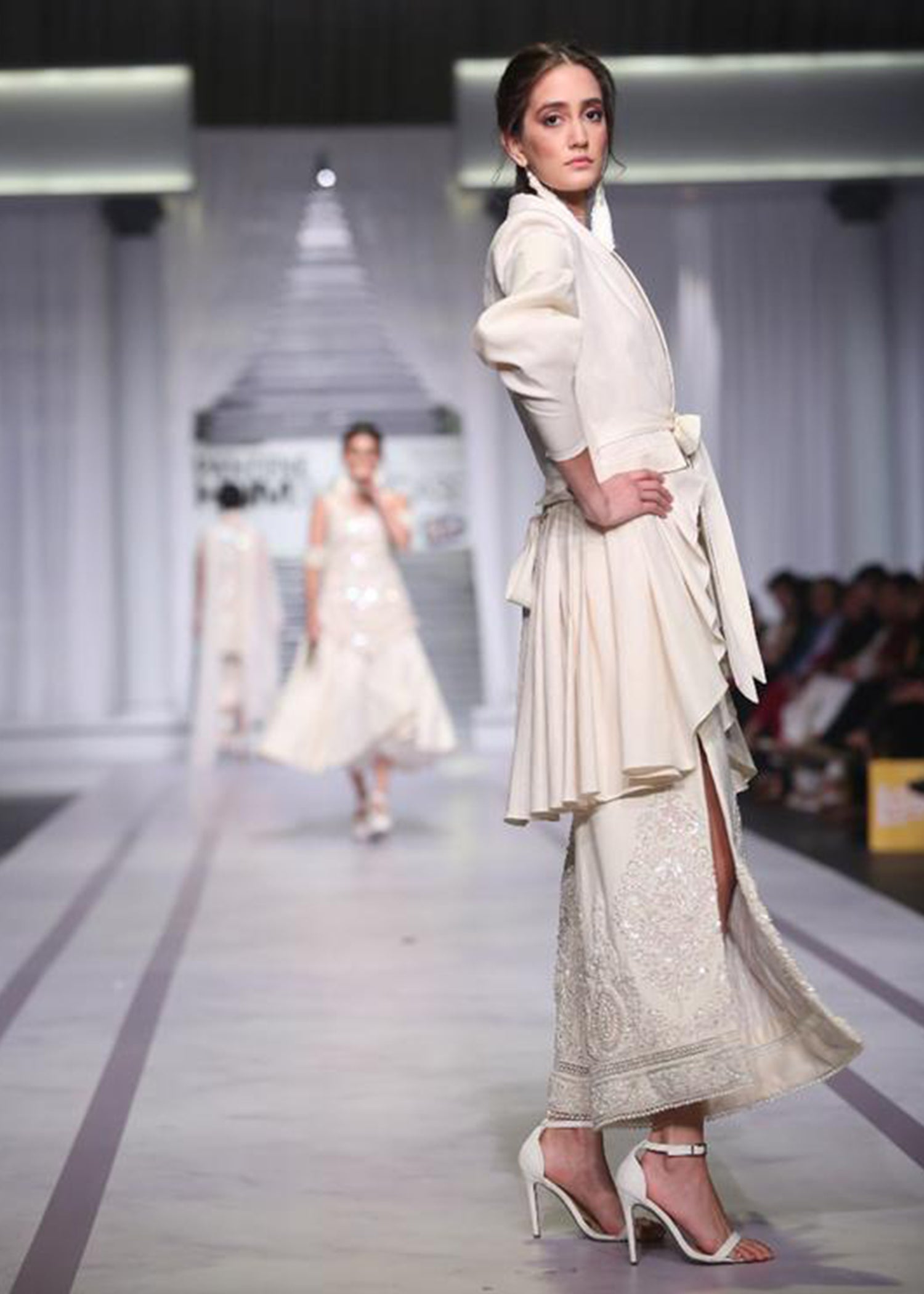 Pleated Coat with a Front Bow, paired with Embroidered Side Slit Skirt